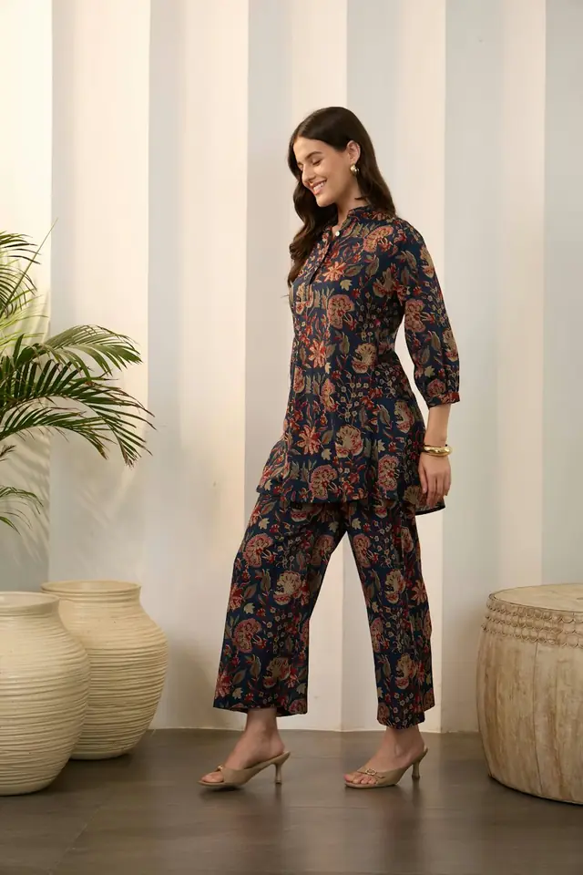 Woman in a navy floral kurta and pants